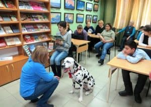 Children with Special Needs Read to Dogs to Develop Language Skills at the Library